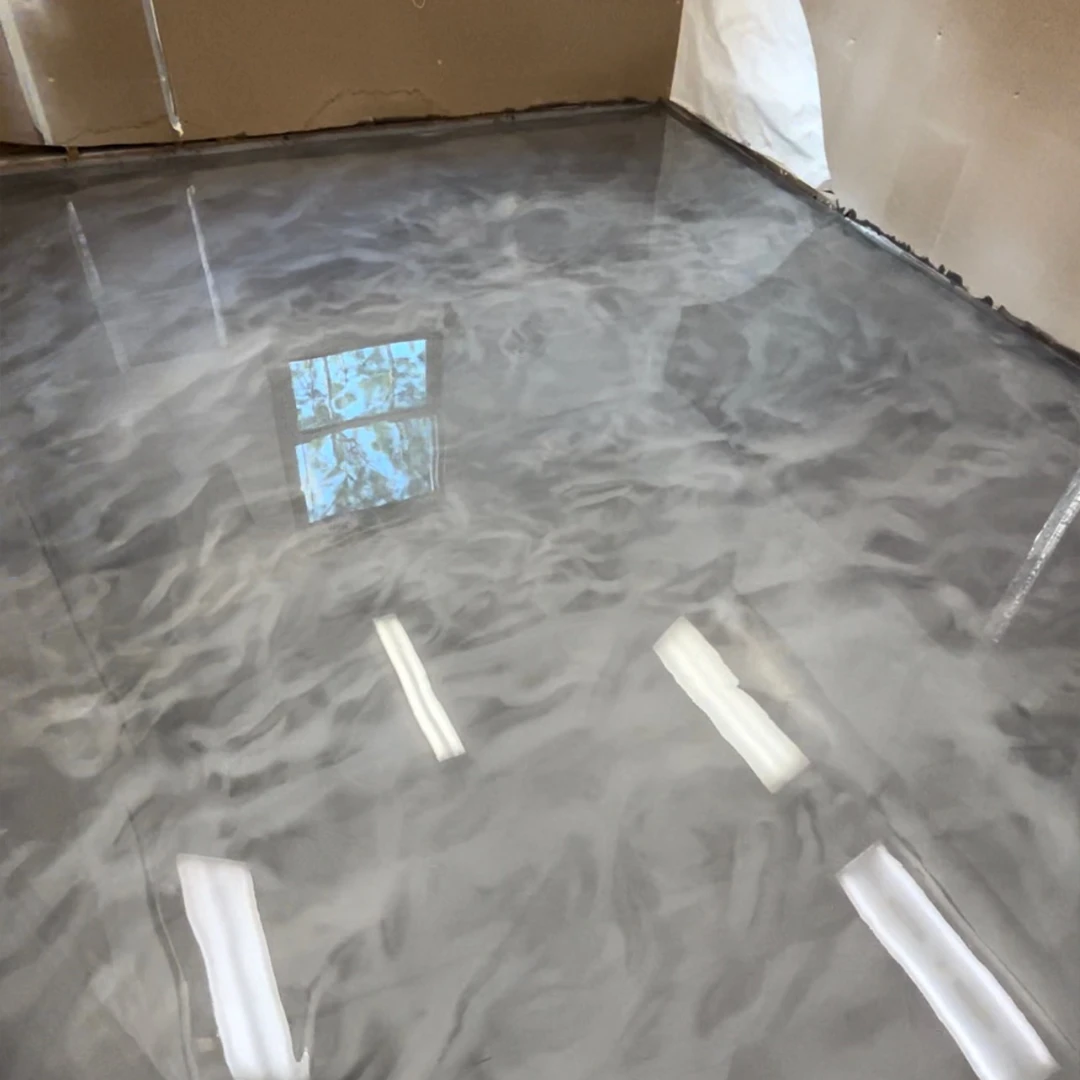 Garage Metallic Epoxy Flooring by Good Boy Coatings
