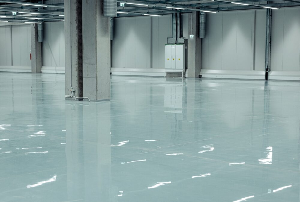 Why Do Warehouses Use Epoxy Instead of Bare Concrete?